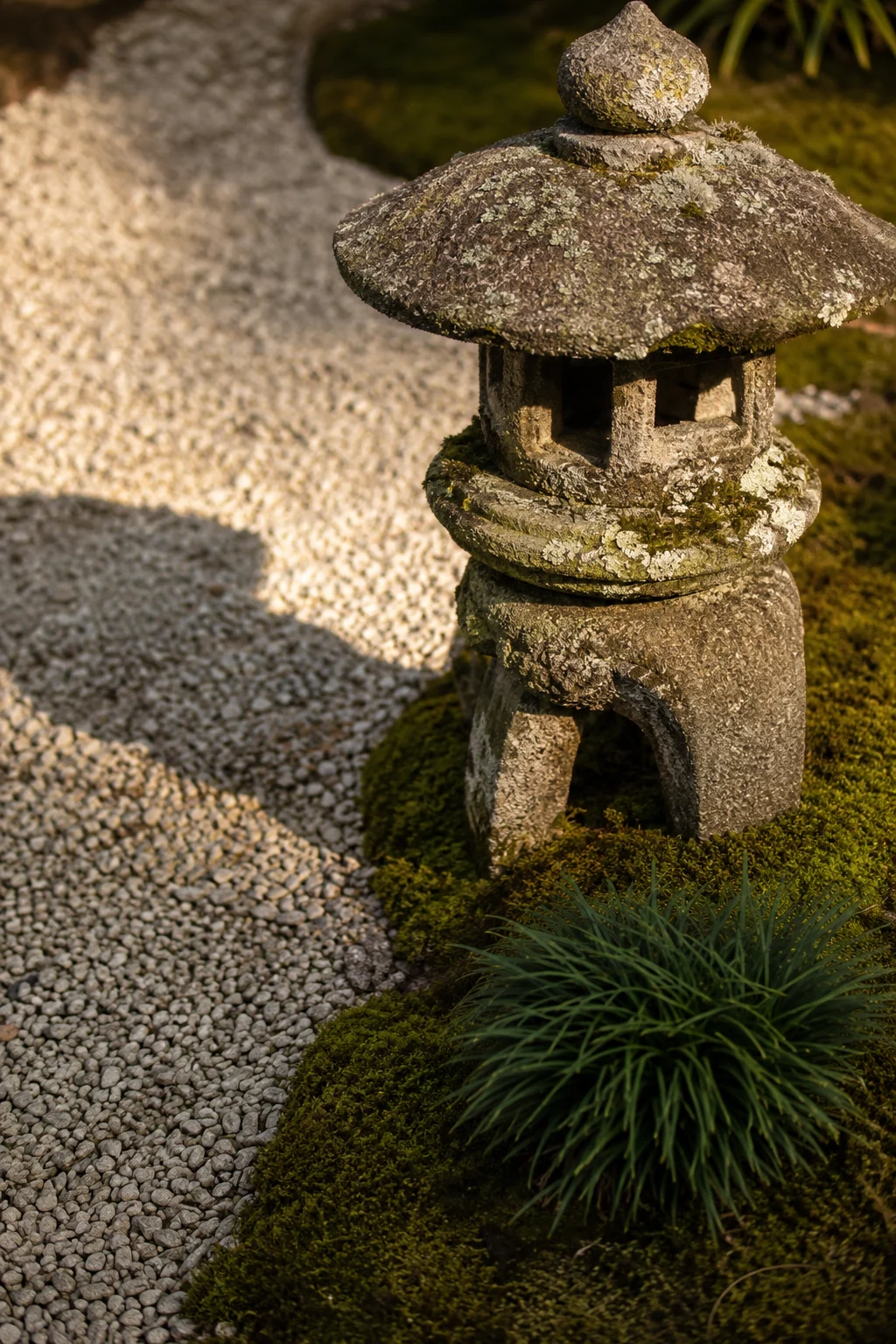 stone lantern focal point in small Japanese garden